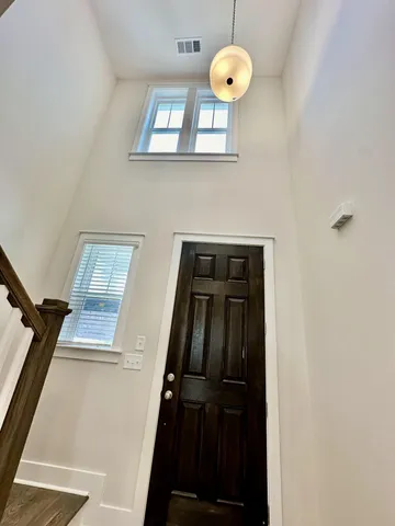 a view of a hallway with entryway