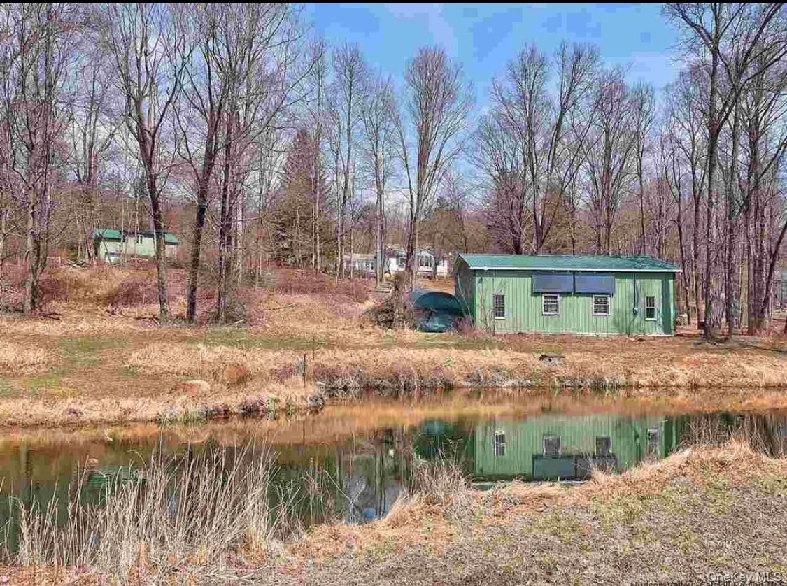 894 Upper Mountain Road Pine Bush, NY 12566 - Photo 19 of 35 View of yard featuring a water view
