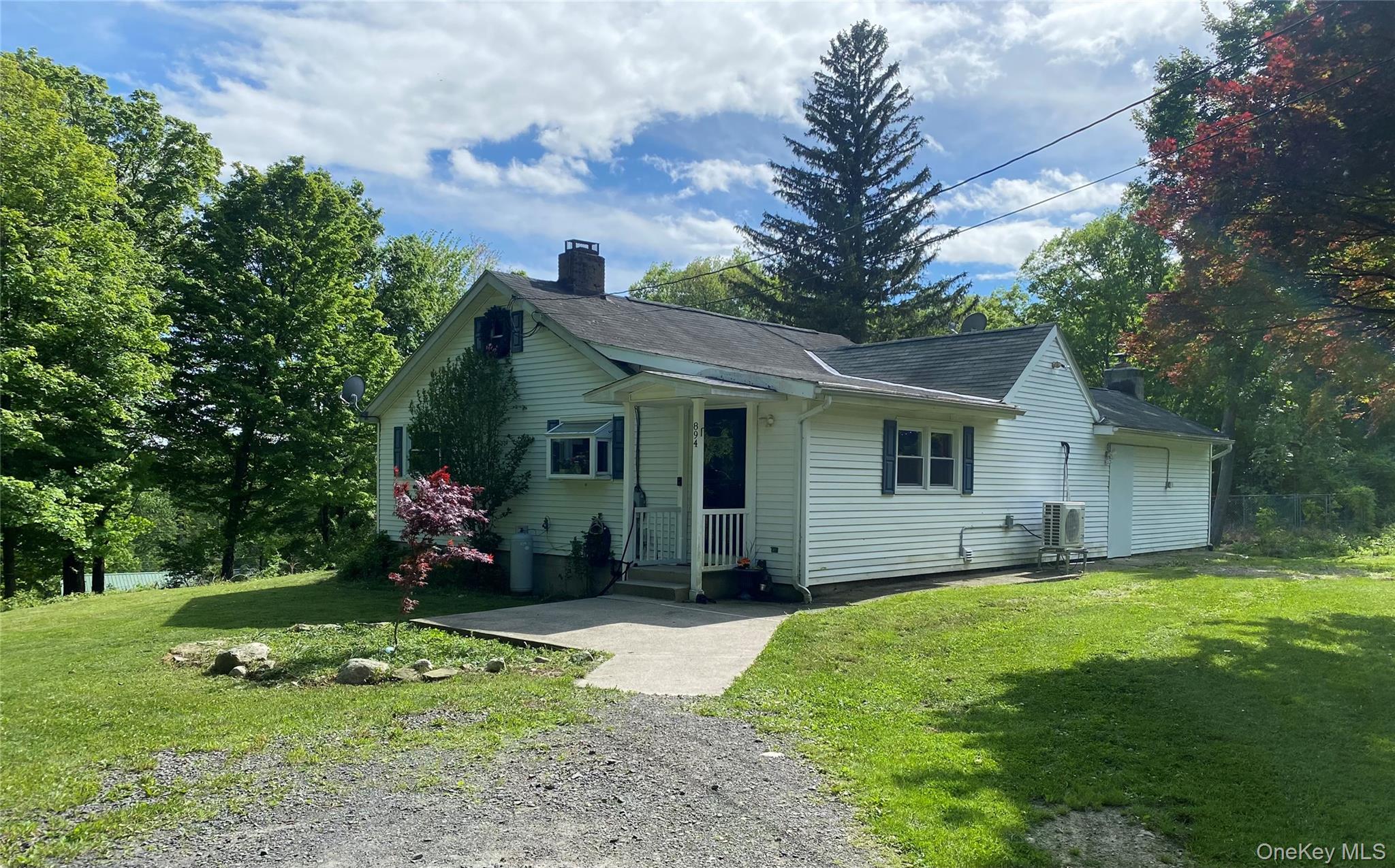 894 Upper Mountain Road Pine Bush, NY 12566 - Photo 2 of 35 View of front of house with a chimney, a front yard, and roof with shingles