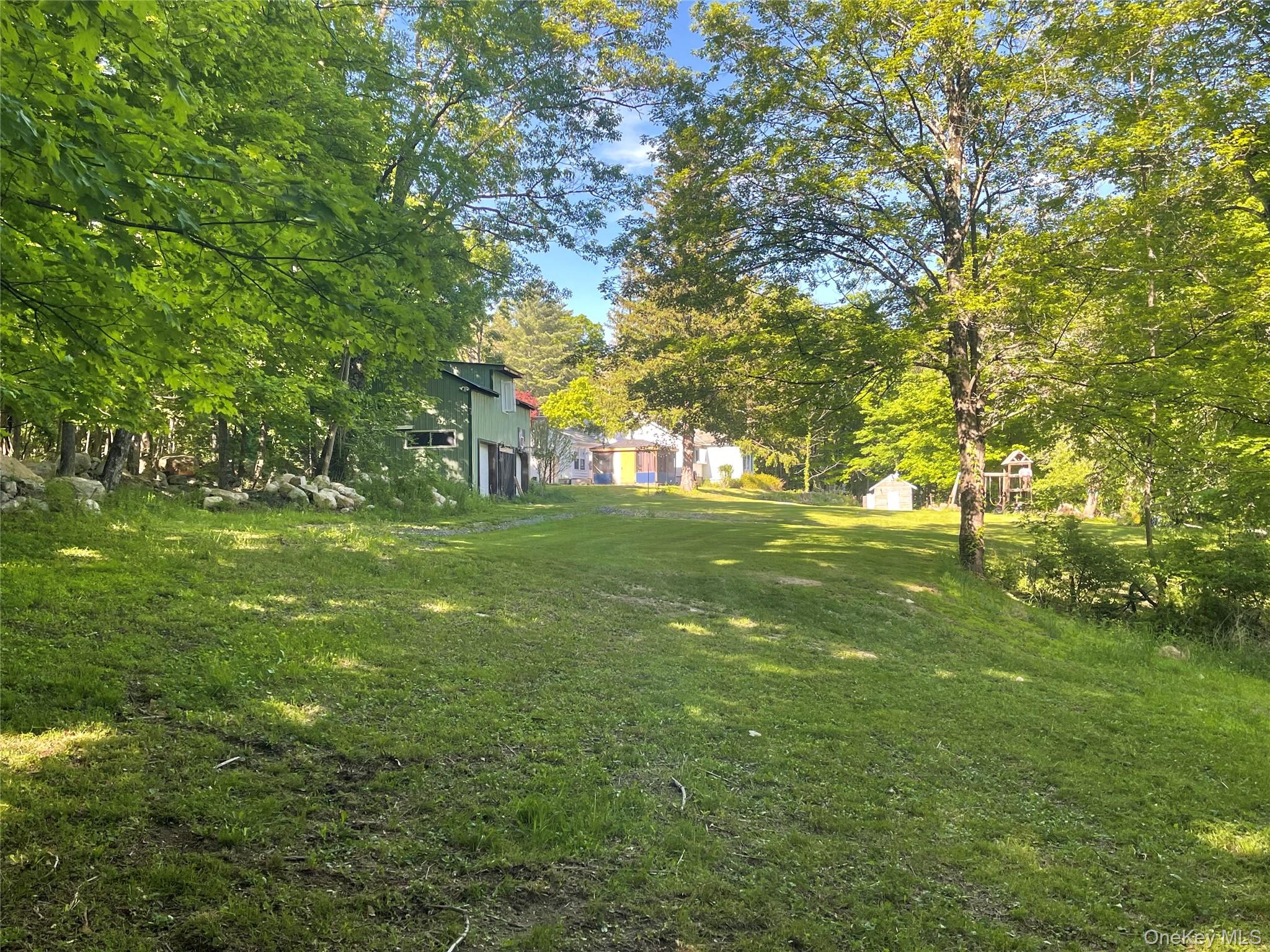 894 Upper Mountain Road Pine Bush, NY 12566 - Photo 26 of 35 View of grassy yard featuring an outdoor structure