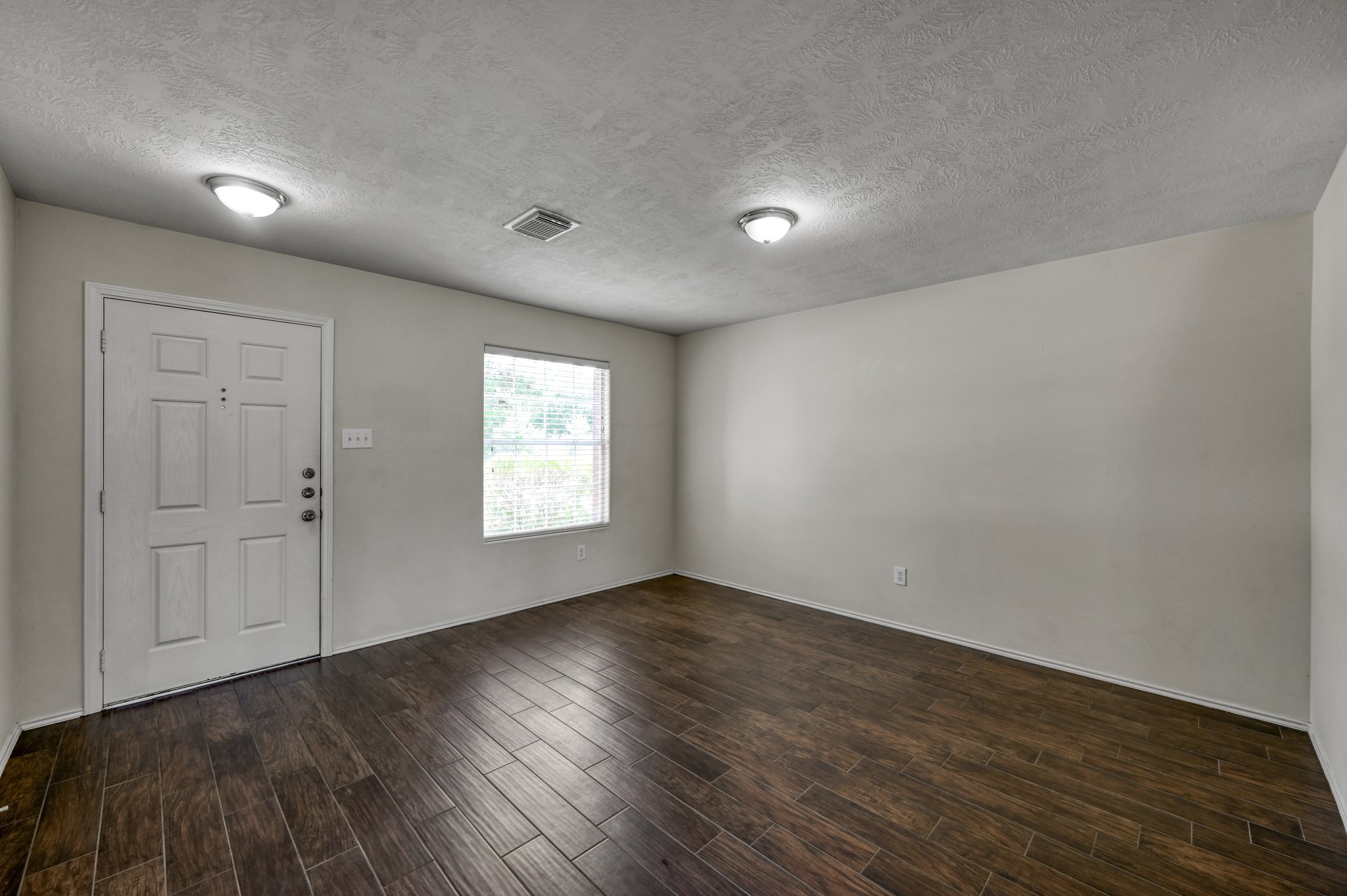 23919 Kingbriar Drive Spring, TX 77373 - Photo 8 of 33 The bright front living and dining space offers flexibility to fit your lifestyle and entertaining needs.