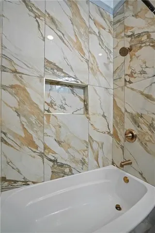 a view of a patio with table and chairs