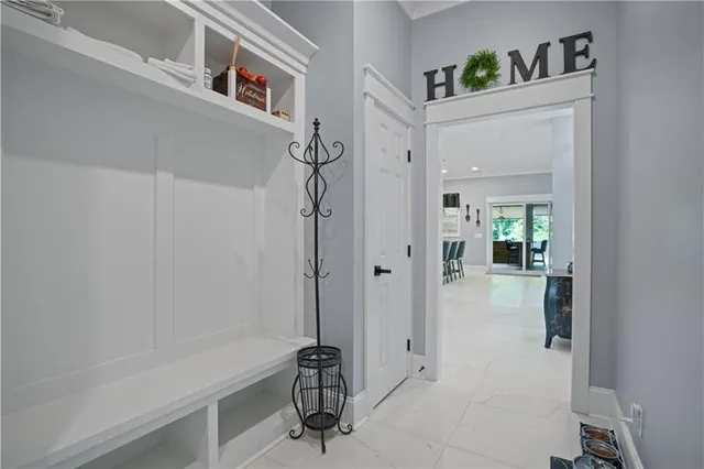 a kitchen with a sink and a large window