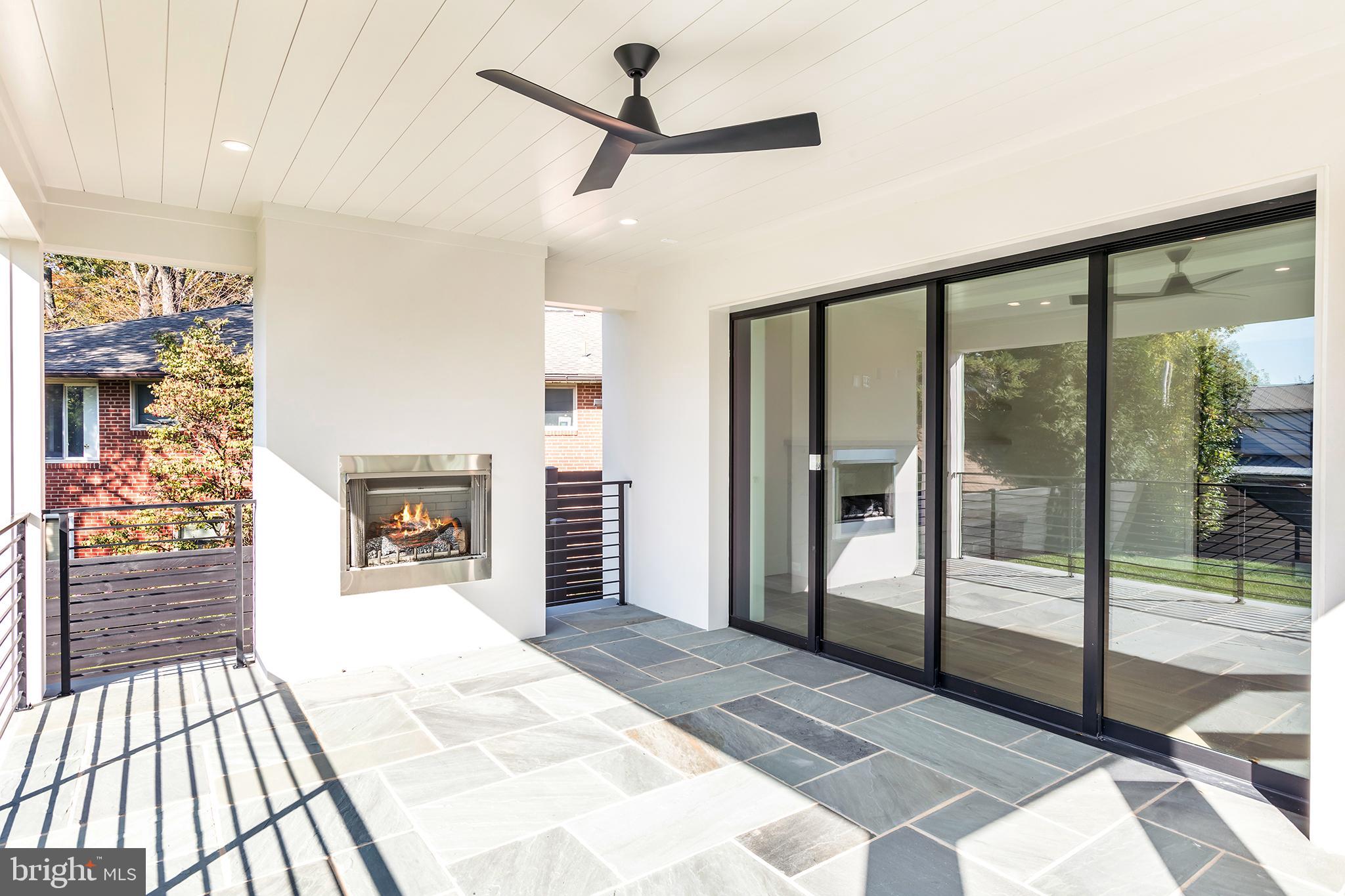 4610 Davidson Drive Chevy Chase, MD 20815 - Photo 27 of 75 Covered porch with gas fireplace