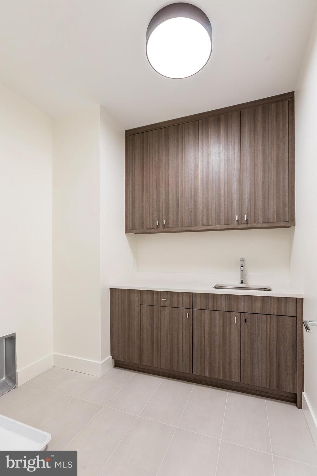 4610 Davidson Drive Chevy Chase, MD 20815 - Photo 47 of 75 Upper Level Laundry Room