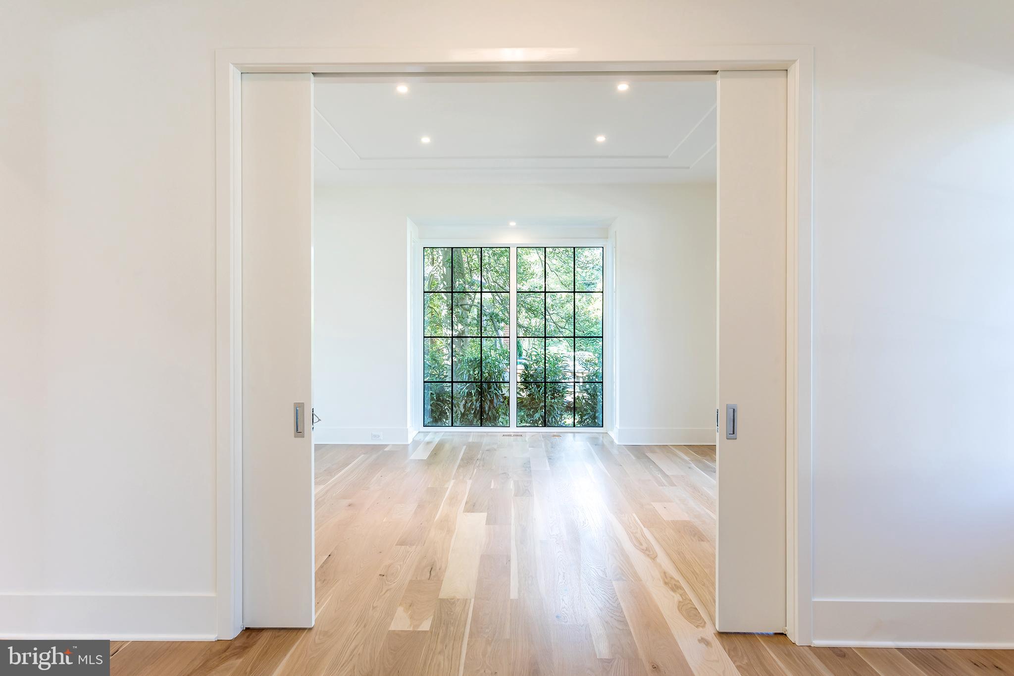 4610 Davidson Drive Chevy Chase, MD 20815 - Photo 5 of 75 Pocket doors into the living room
