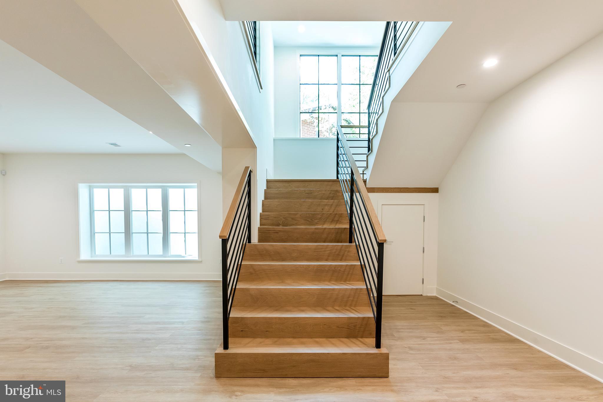 4610 Davidson Drive Chevy Chase, MD 20815 - Photo 60 of 75 Light shaft stairwell & windows to lower level