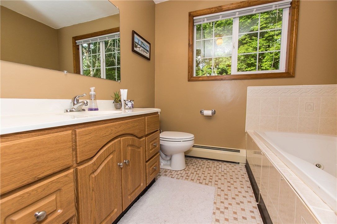 166 Trimtown Road Scituate, RI 02857 - Photo 14 of 32 Full bath main level with tub and shower stall
