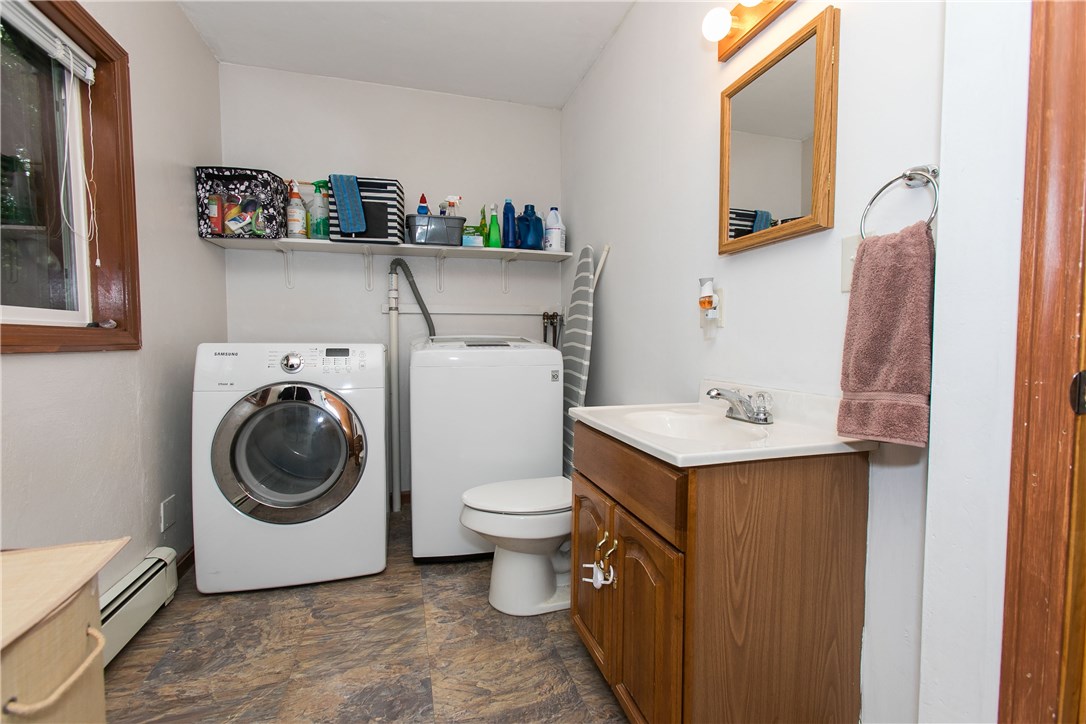166 Trimtown Road Scituate, RI 02857 - Photo 21 of 32 Laundry with half bath on main level