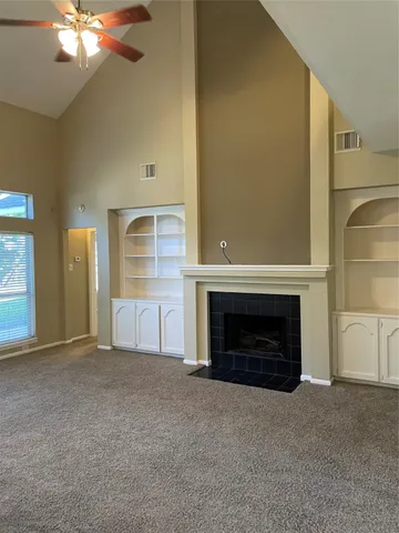a kitchen with stainless steel appliances a sink and cabinets