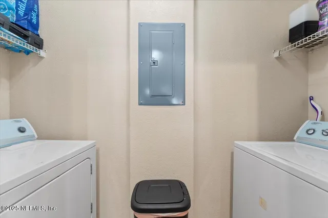 a view of kitchen and dining area with furniture
