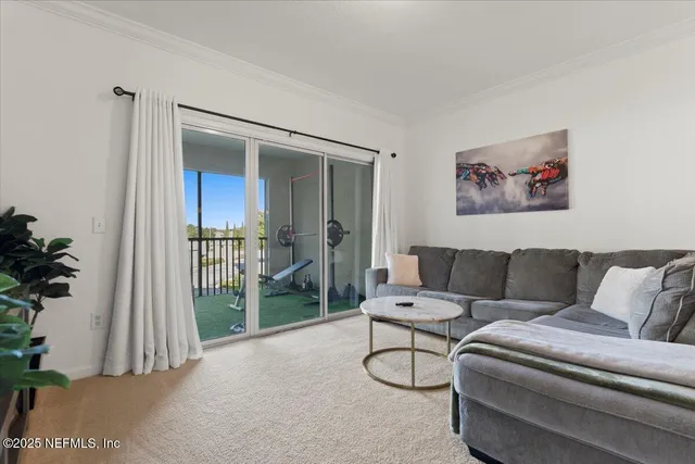 a room with a sink and a refrigerator