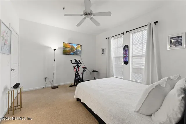 a reading room with furniture and a garden