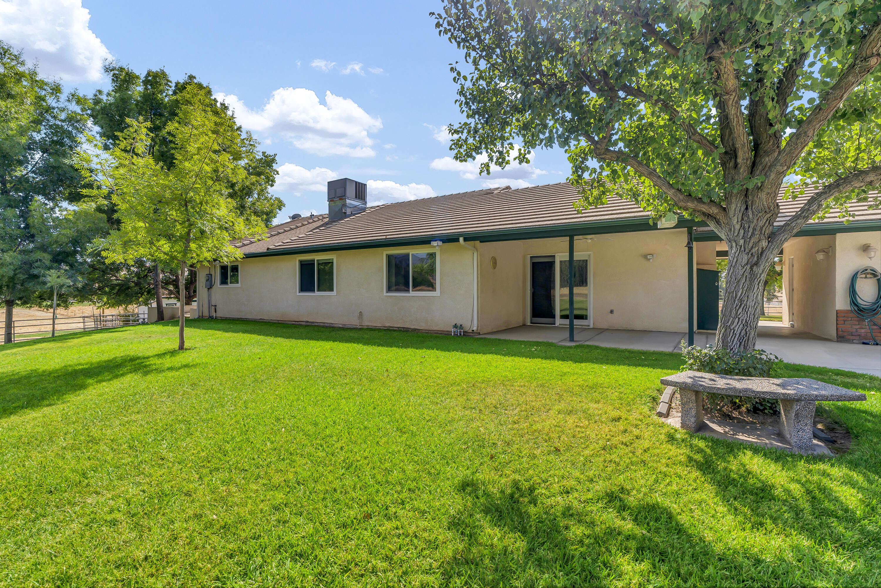 18002 320th Road Springville, CA 93265 - Photo 42 of 56 a view of a house with backyard and a tree