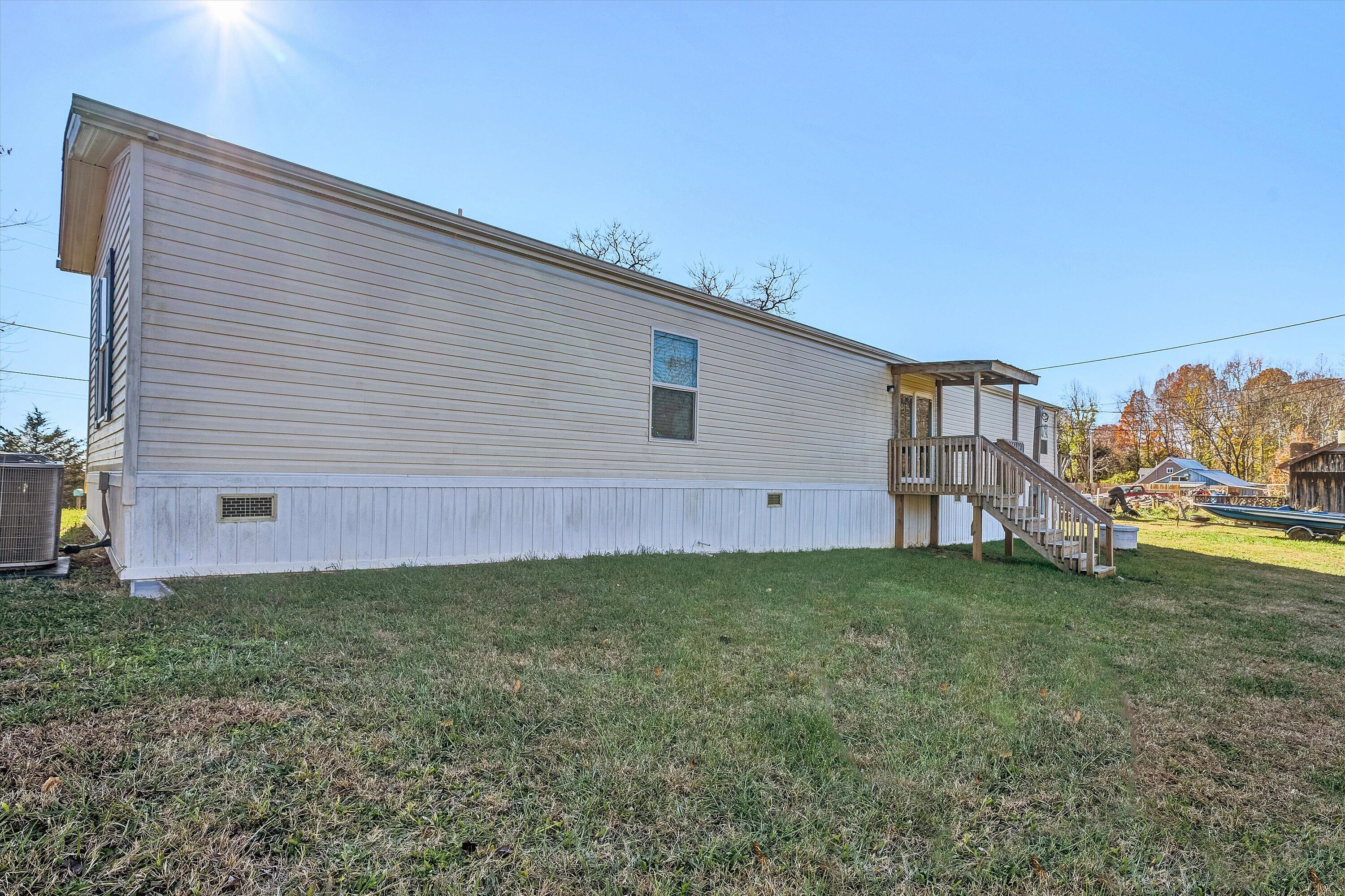 1405 Doe Run Road Rocky Mount, VA 24151 - Photo 24 of 27 a view of a backyard of the house