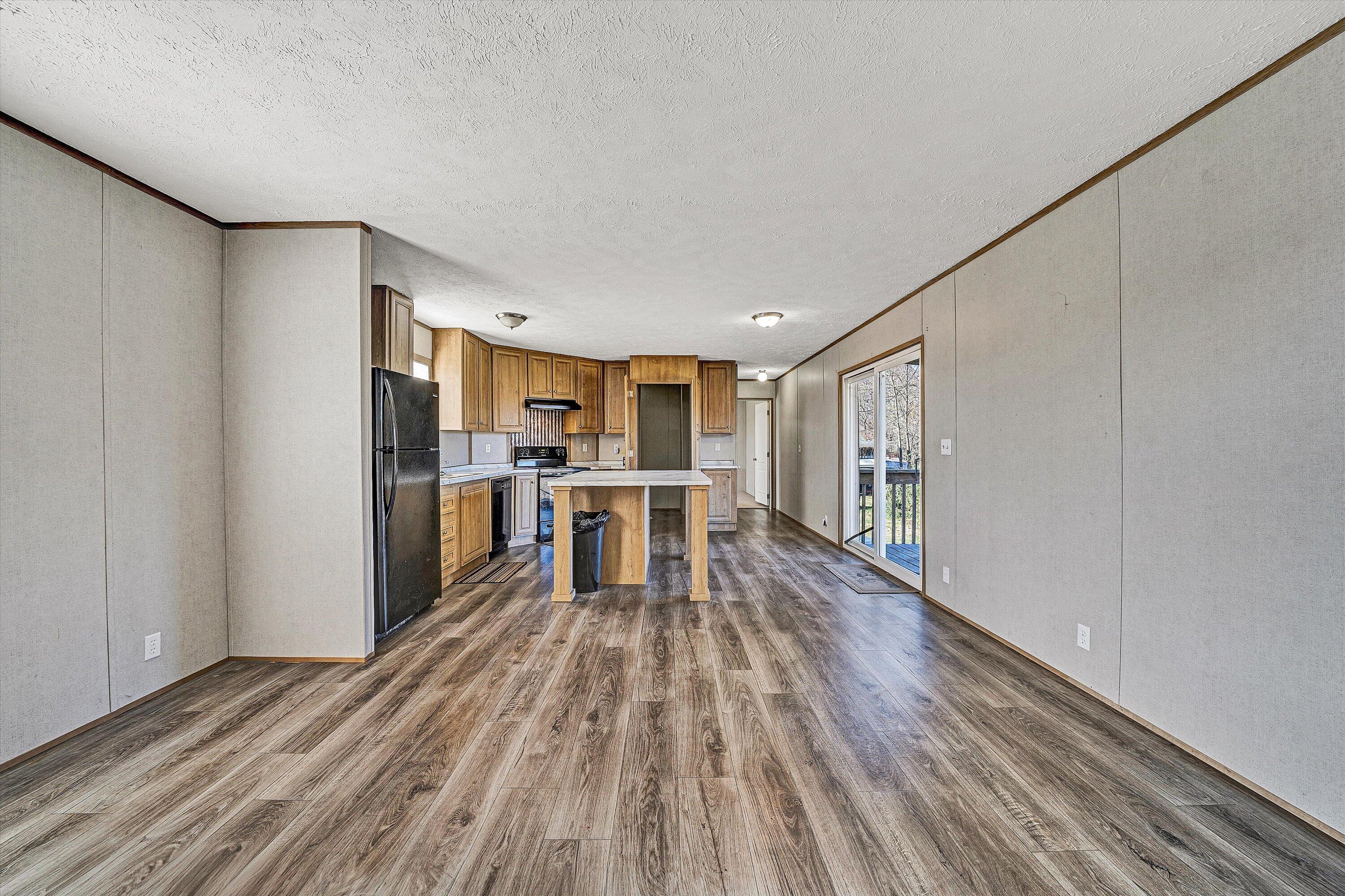 1405 Doe Run Road Rocky Mount, VA 24151 - Photo 6 of 27 a view of kitchen with wooden floor