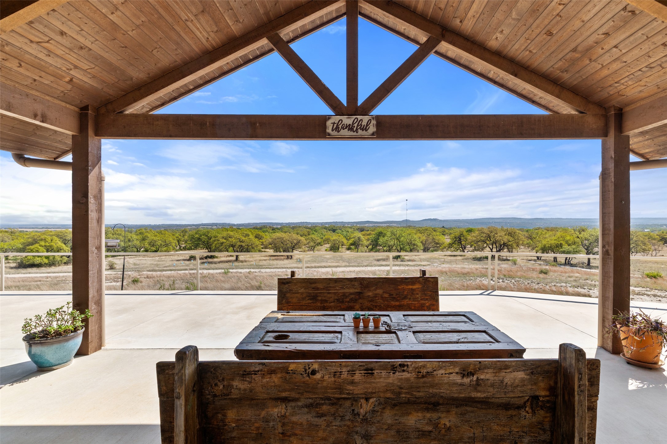 546 Lazy Oak Road Hye, TX 78635 - Photo 2 of 34 a view of a city from a balcony