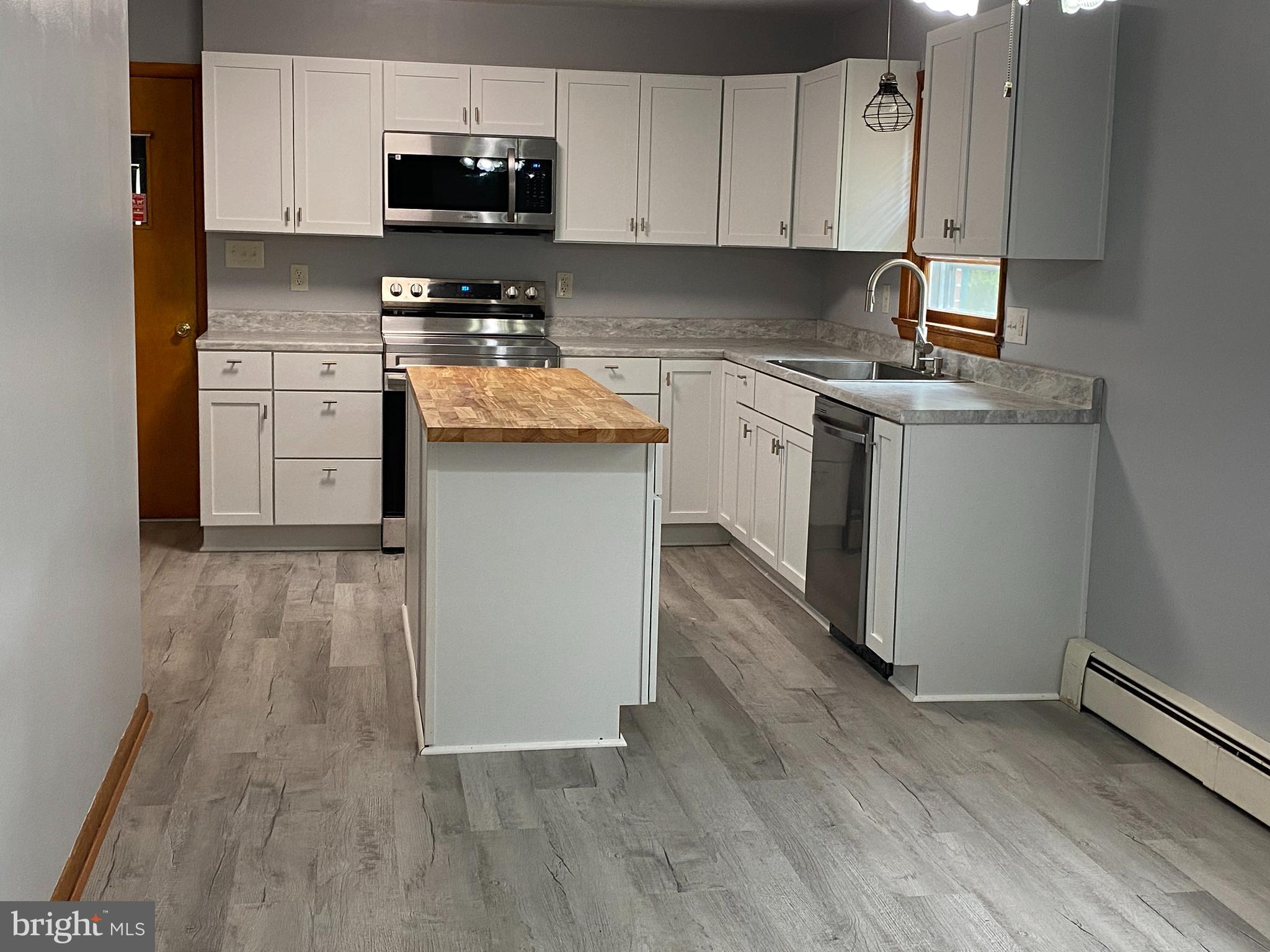 13343 Keener Road Hagerstown, MD 21742 - Photo 12 of 56 a kitchen with a sink cabinets and appliances