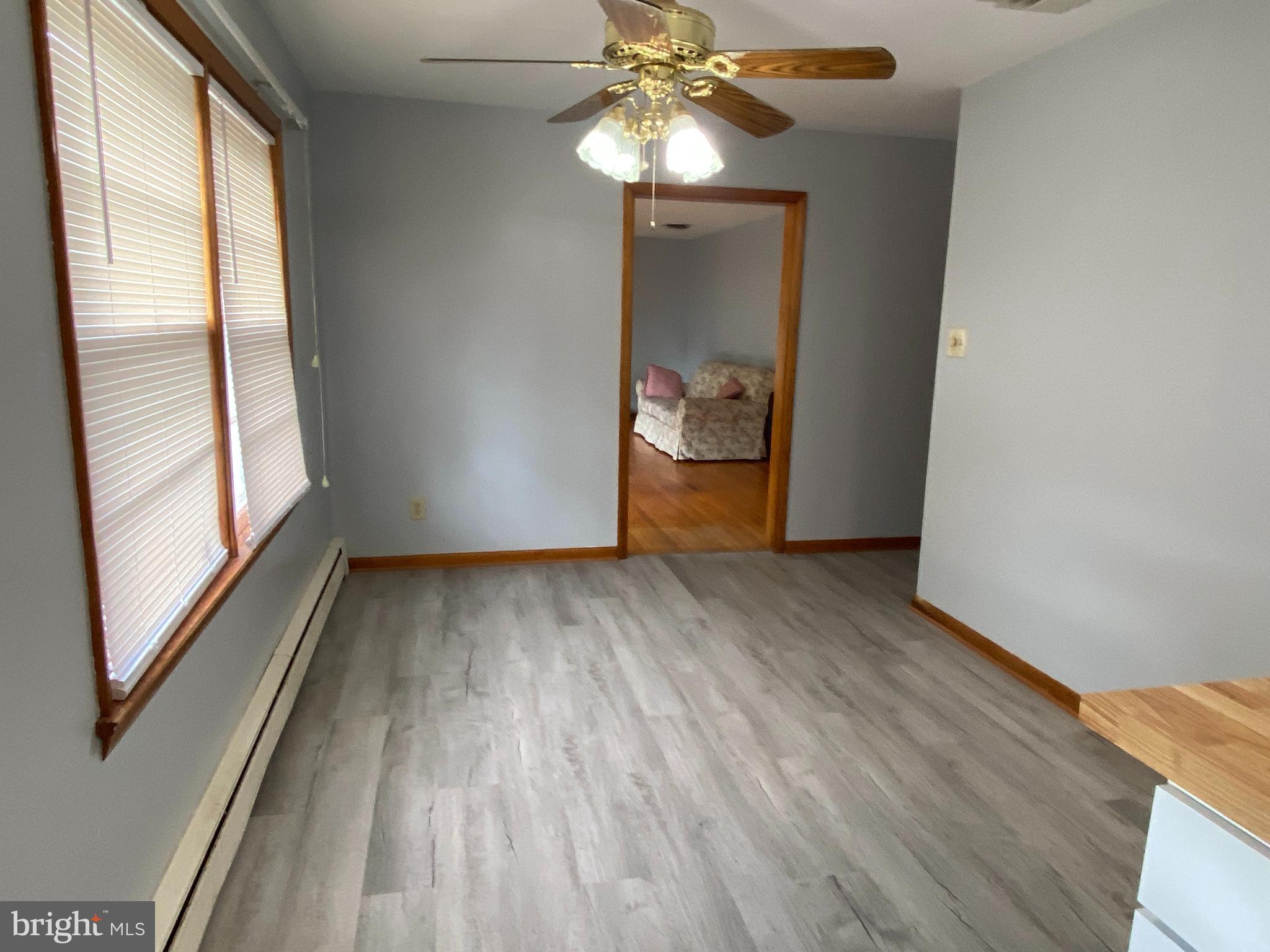 13343 Keener Road Hagerstown, MD 21742 - Photo 15 of 56 a view of a room with wooden floor fan and window
