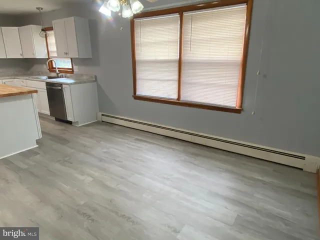 a bed room with a bed and a fireplace