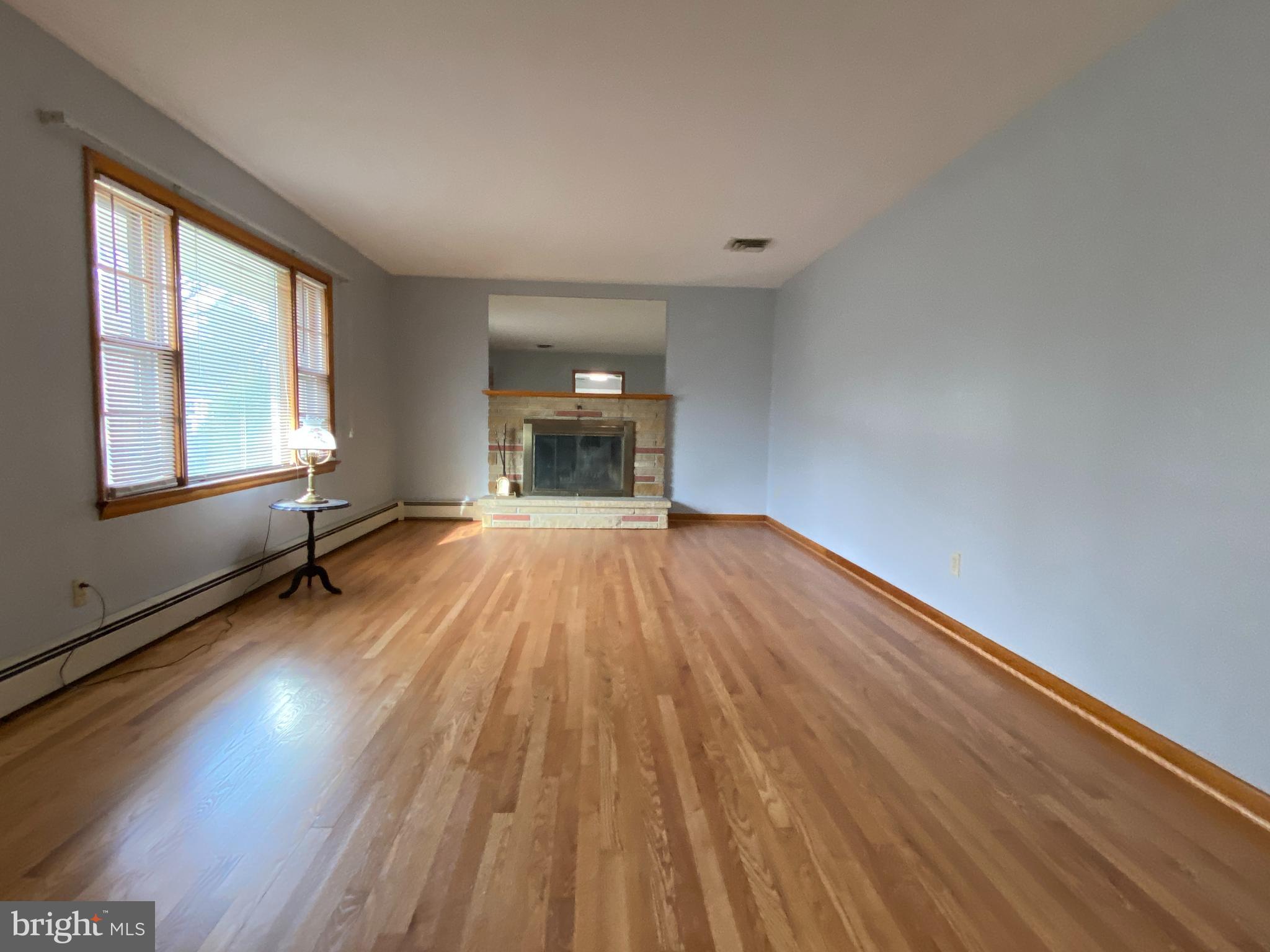 13343 Keener Road Hagerstown, MD 21742 - Photo 18 of 56 wooden floor in an empty room with a window