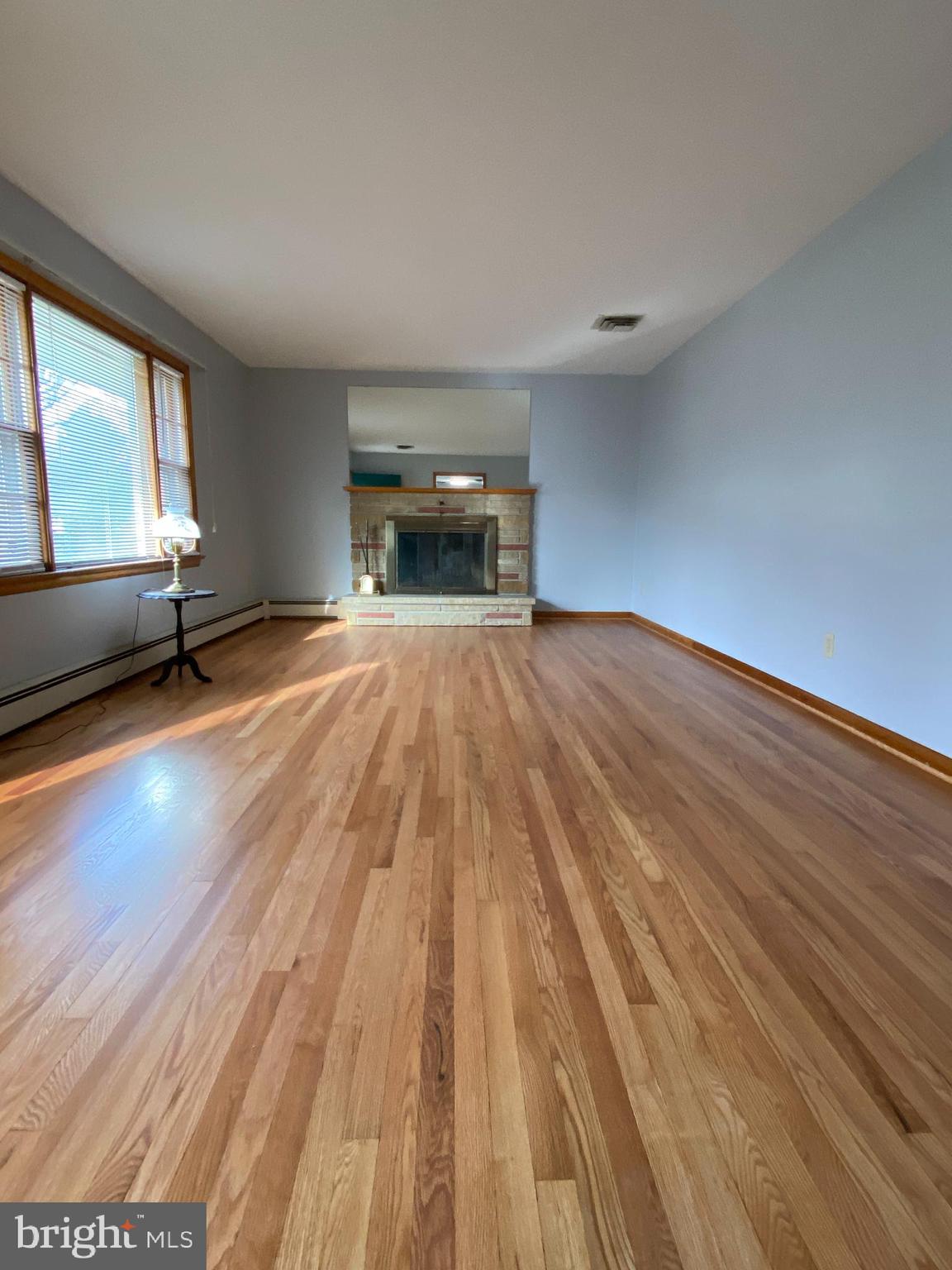 13343 Keener Road Hagerstown, MD 21742 - Photo 19 of 56 a view of empty room with wooden floor and fan