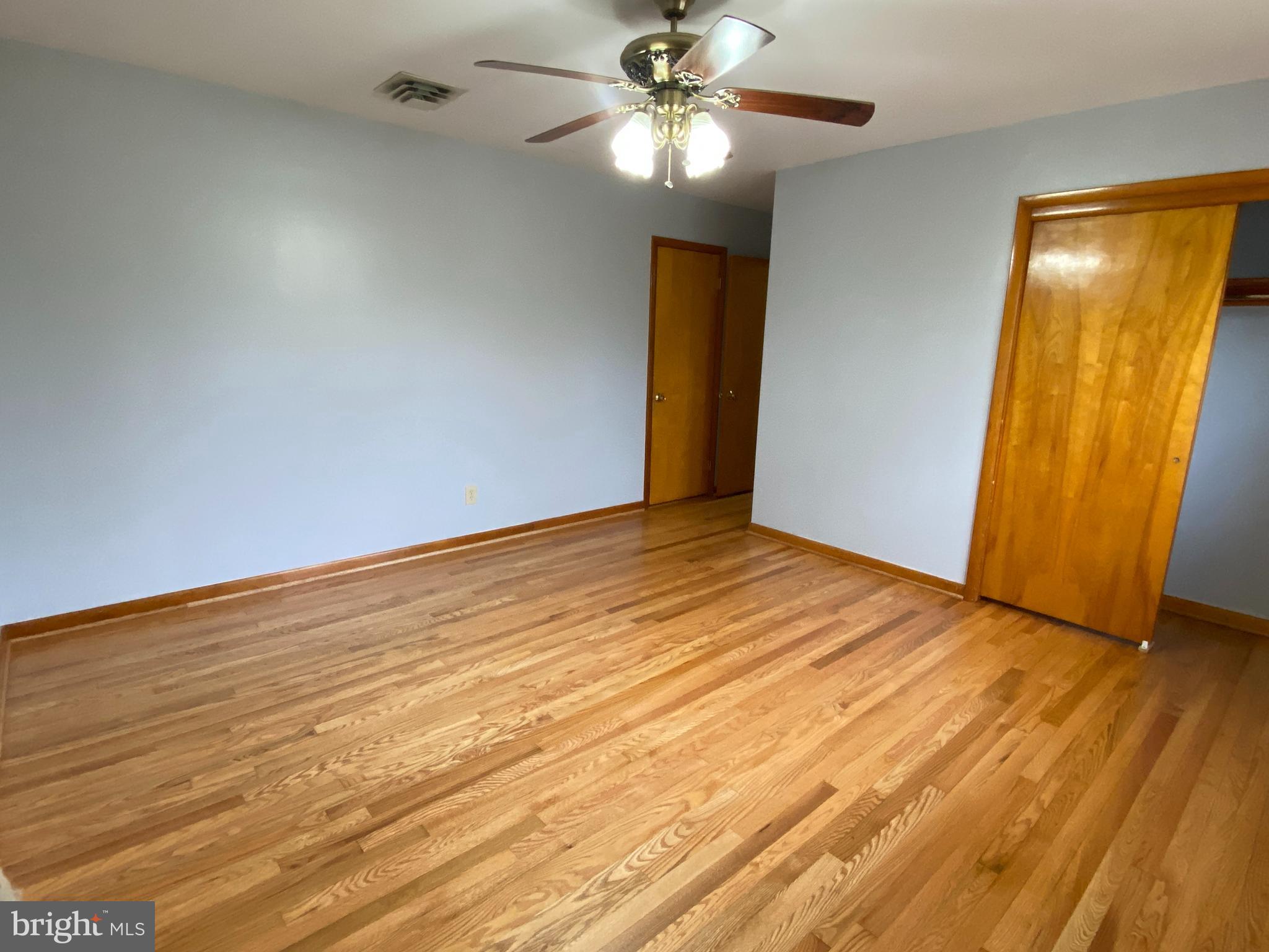 13343 Keener Road Hagerstown, MD 21742 - Photo 21 of 56 a view of an empty room with window and wooden floor