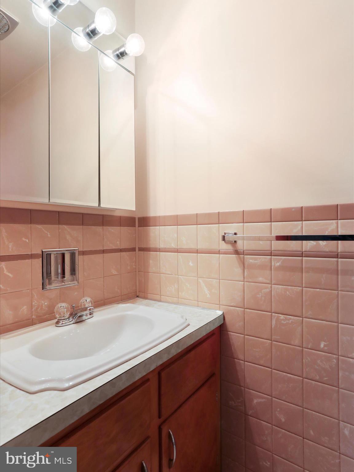 13343 Keener Road Hagerstown, MD 21742 - Photo 22 of 56 a bathroom with a sink and a mirror