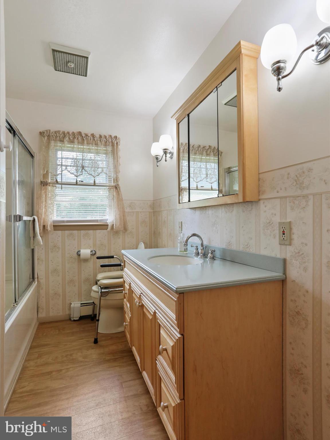 13343 Keener Road Hagerstown, MD 21742 - Photo 27 of 56 a bathroom with a sink a vanity and a mirror