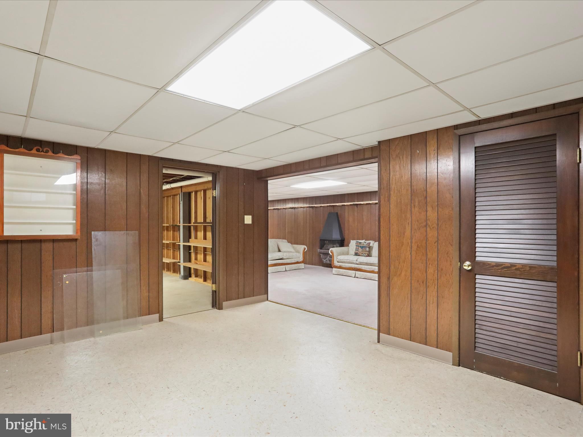13343 Keener Road Hagerstown, MD 21742 - Photo 33 of 56 a view of a hallway with wooden shelves