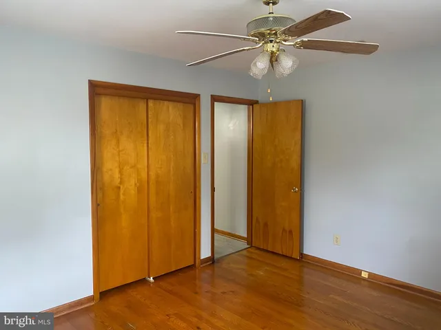 a view of a table and chairs in the garden
