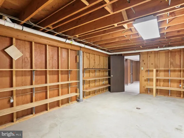 a view of a hallway with staircase