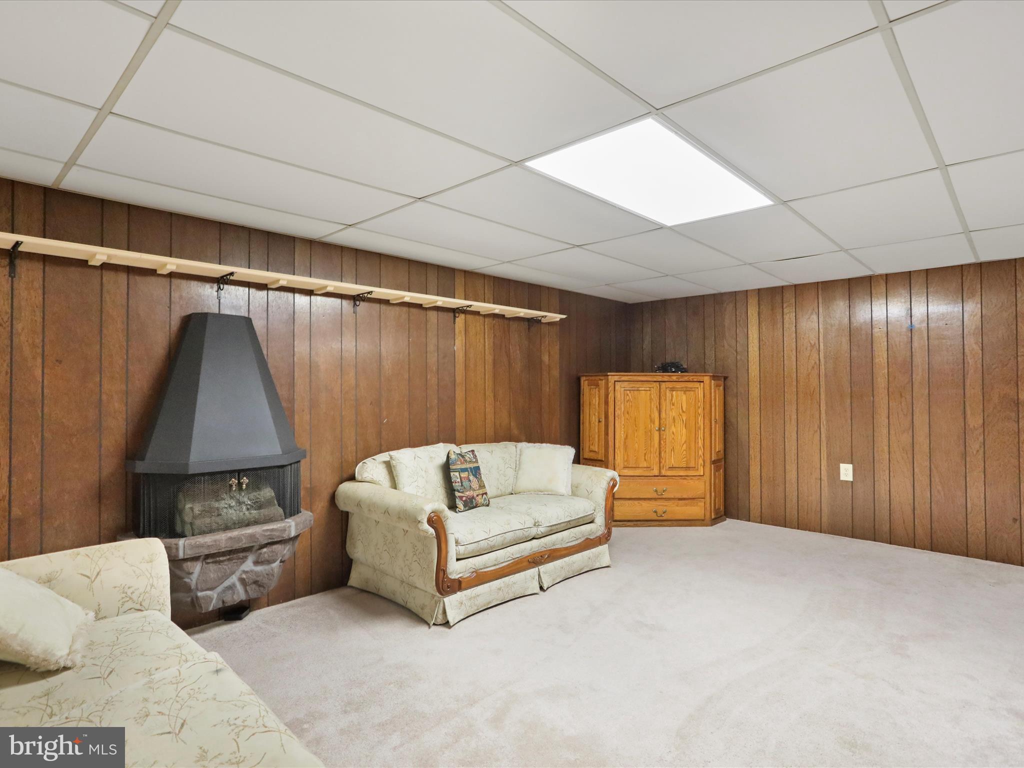 13343 Keener Road Hagerstown, MD 21742 - Photo 36 of 56 a living room with furniture and a couch