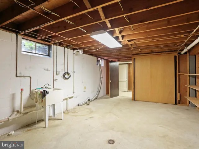 a front view of house with yard and outdoor seating