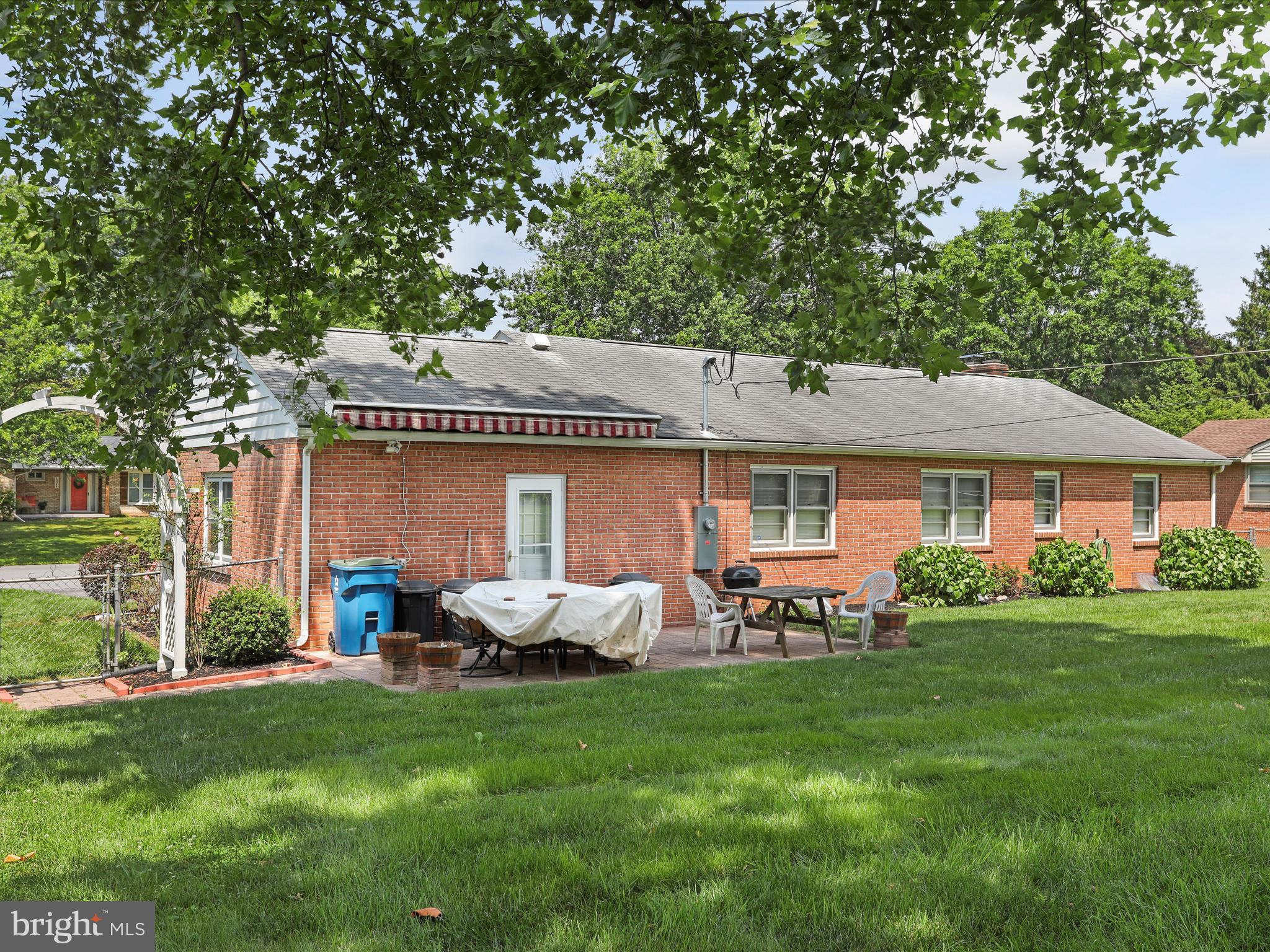 13343 Keener Road Hagerstown, MD 21742 - Photo 39 of 56 a front view of house with yard and outdoor seating