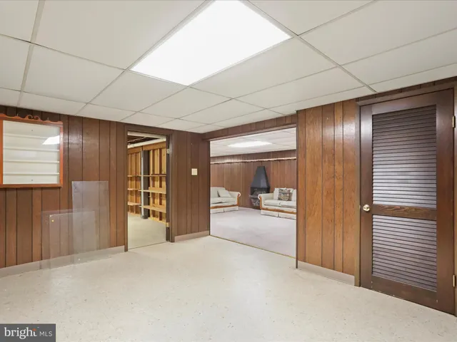 a view of a house with a yard and plants