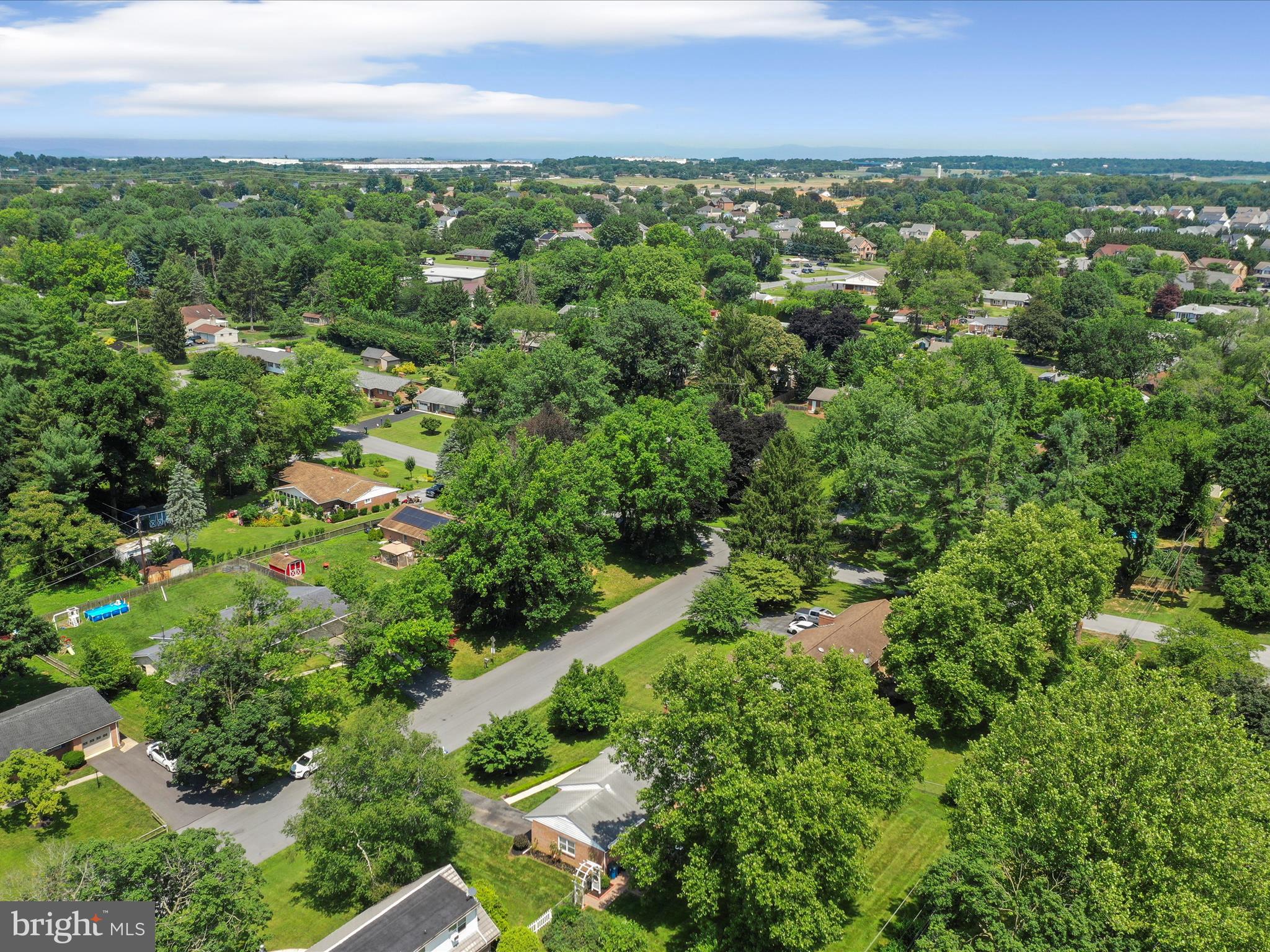 13343 Keener Road Hagerstown, MD 21742 - Photo 46 of 56 an aerial view of residential houses with outdoor space and trees