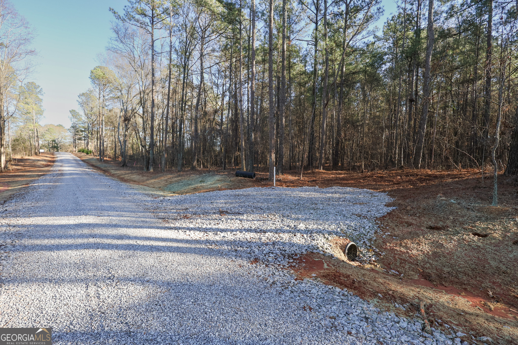 144 Berry Road, Unit LOT 13 Barnesville, GA 30204 - Photo 10 of 12 a backyard of a house with lots of green space