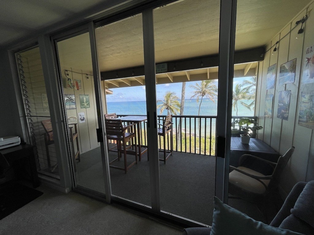 320 Papaloa Road, Unit 302 Kapaa, HI 96746 - Photo 3 of 16 a view of a porch with furniture