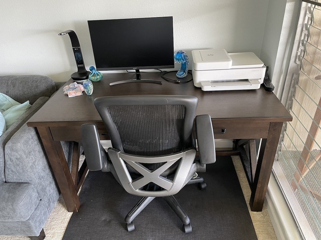 320 Papaloa Road, Unit 302 Kapaa, HI 96746 - Photo 8 of 16 a dining room with furniture and a flat screen tv