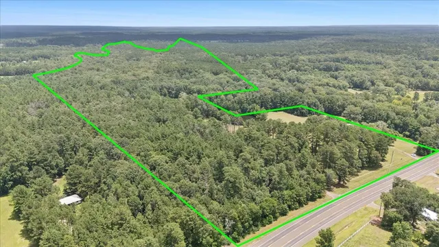 a view of a yard with an outdoor space