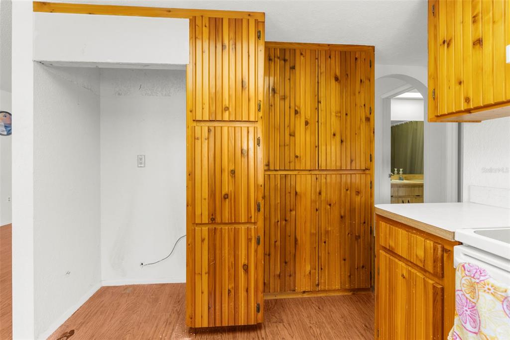 22249 Powell Road Brooksville, FL 34601 - Photo 17 of 43 a view of a door with wooden floor