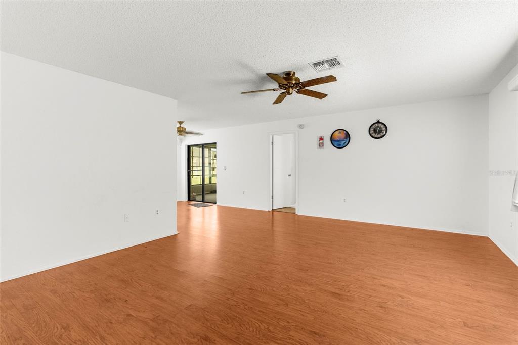 22249 Powell Road Brooksville, FL 34601 - Photo 21 of 43 a view of empty room with windows