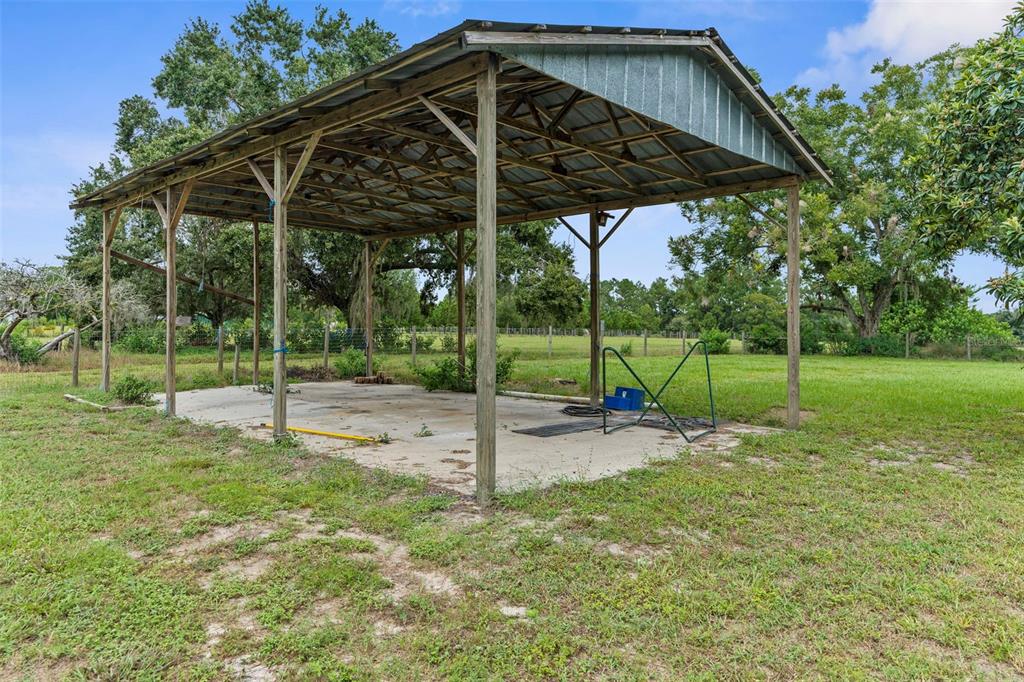 22249 Powell Road Brooksville, FL 34601 - Photo 32 of 43 a view of a backyard