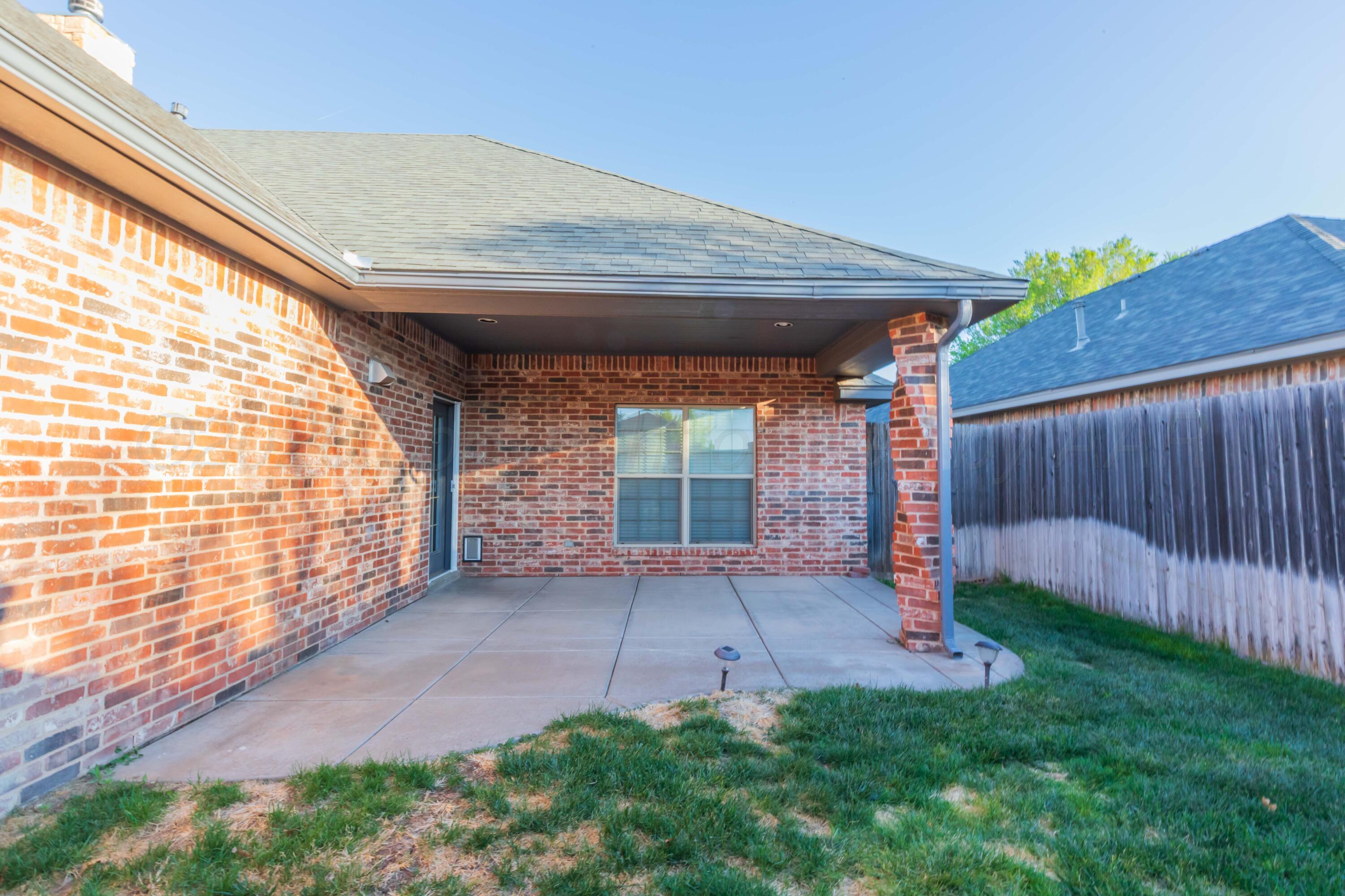 7718 Pinnacle Drive Amarillo, TX 79119 - Photo 60 of 66 SIDE YARD VIEW 1