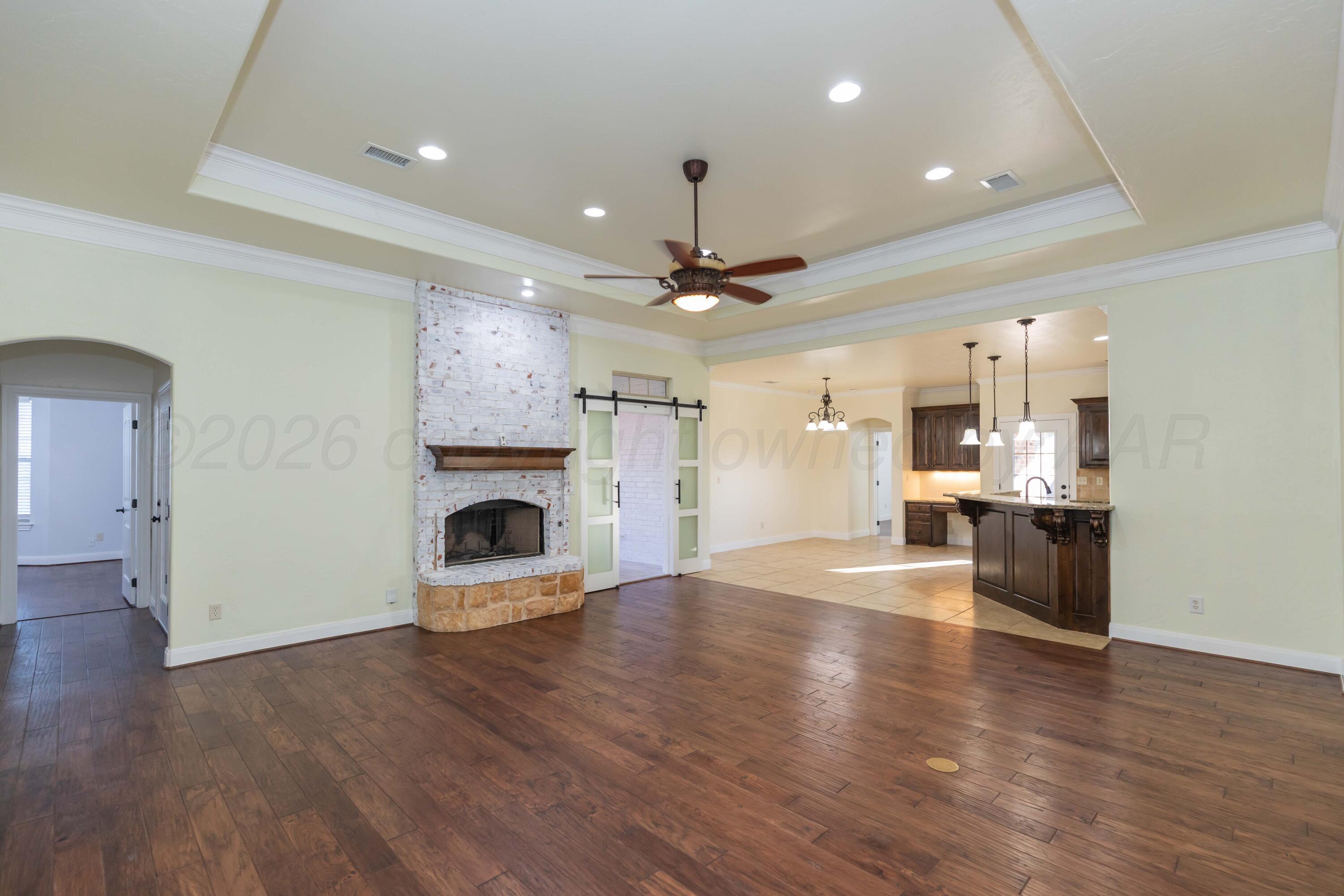 7718 Pinnacle Drive Amarillo, TX 79119 - Photo 9 of 66 LIVING ROOM VIEW 2