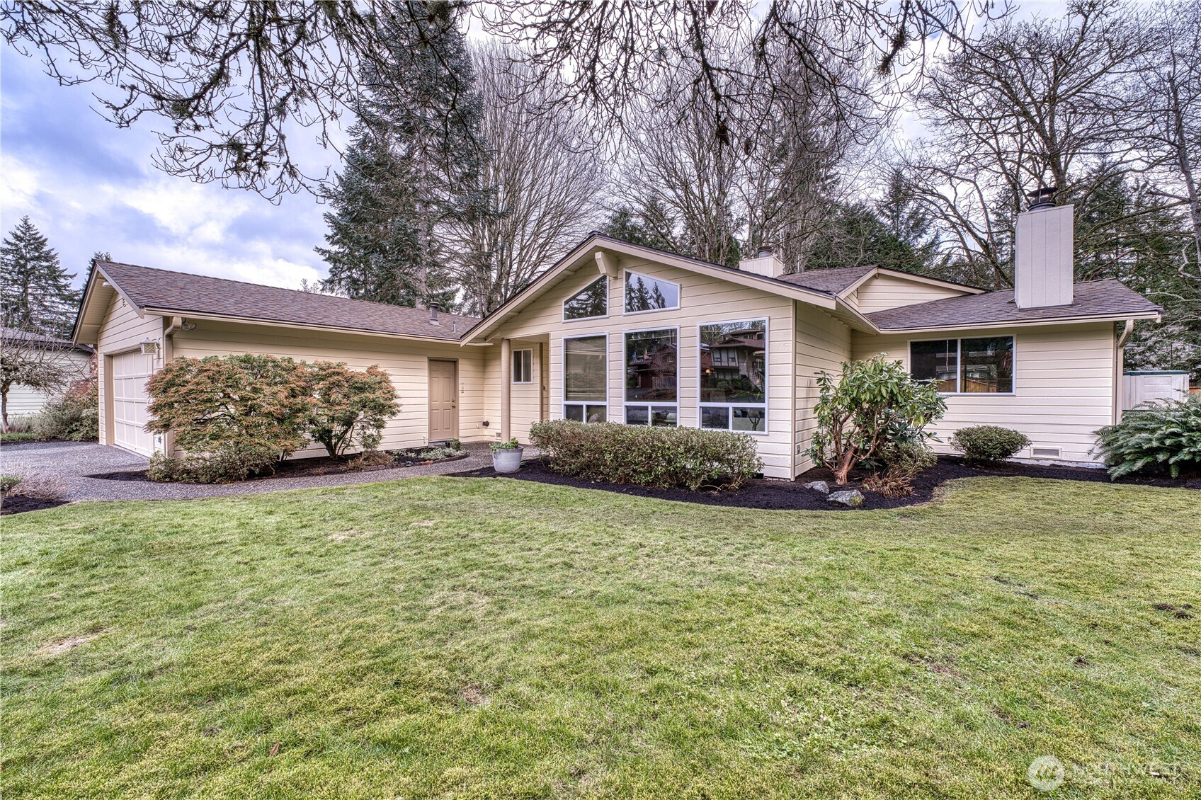 23823 90th Place West Edmonds, WA 98026 - Photo 2 of 40 a front view of a house with garden