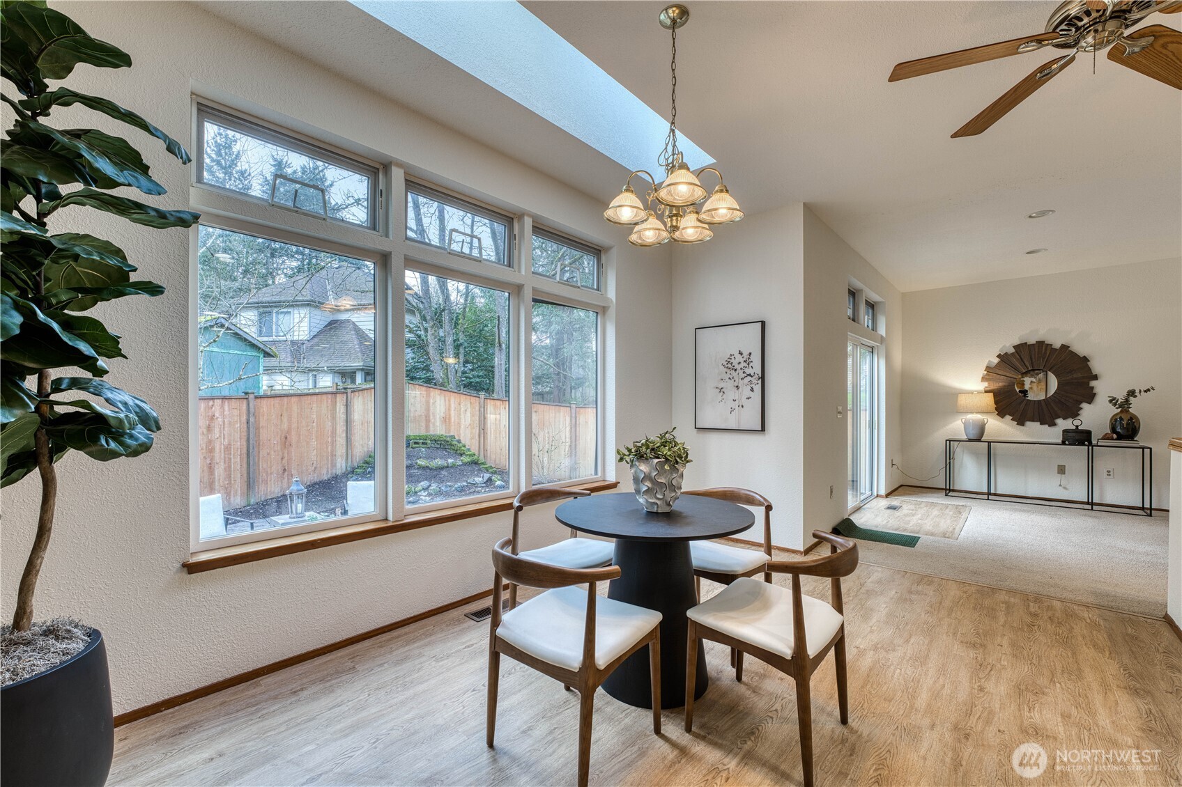 23823 90th Place West Edmonds, WA 98026 - Photo 22 of 40 a view of a dining room with furniture wooden floor and chandelier