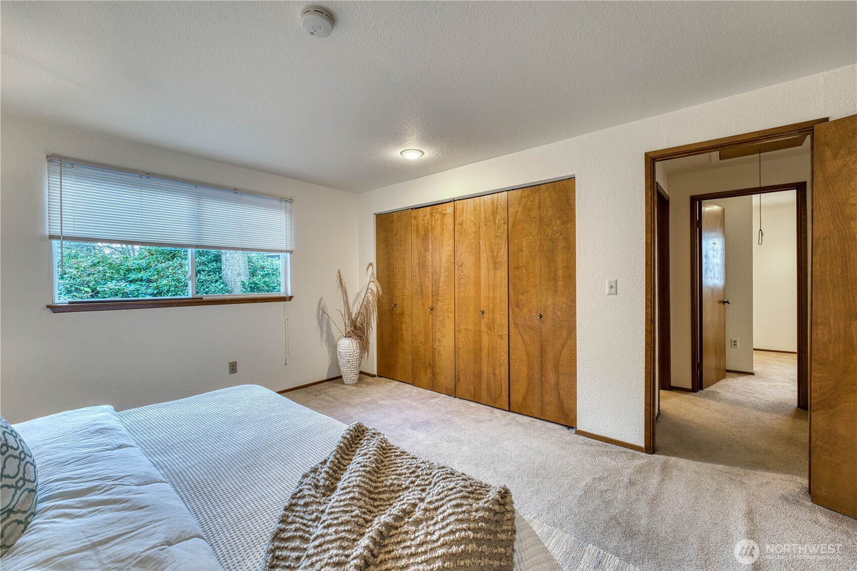 23823 90th Place West Edmonds, WA 98026 - Photo 28 of 40 a bedroom with a bed and a window
