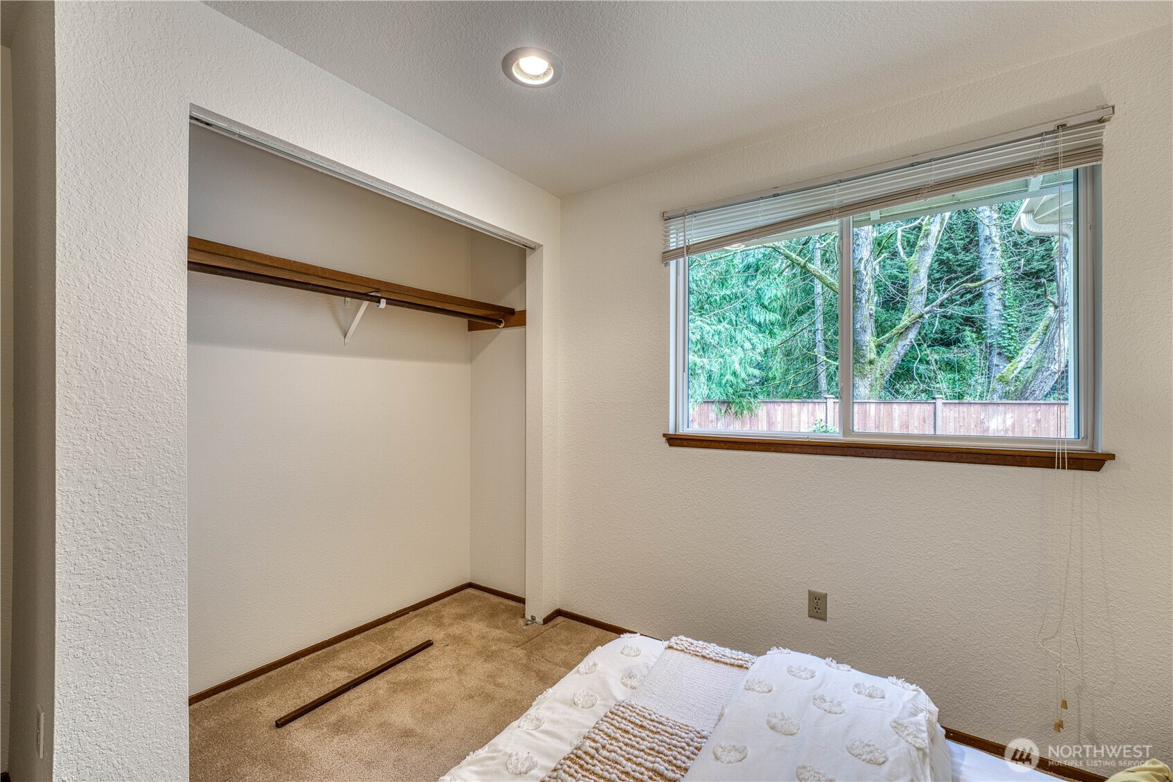 23823 90th Place West Edmonds, WA 98026 - Photo 35 of 40 a bedroom with a bed and a window